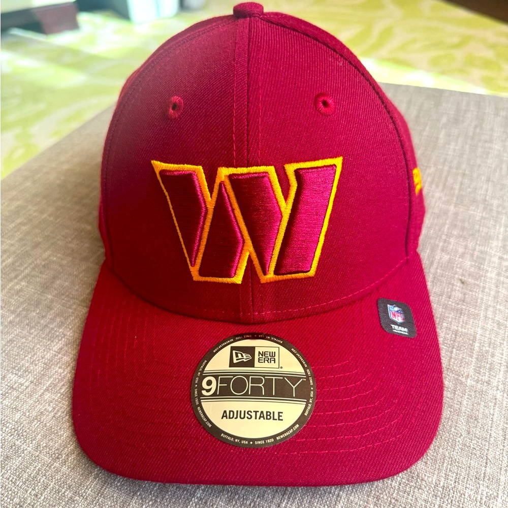 Washington Commanders baseball cap.